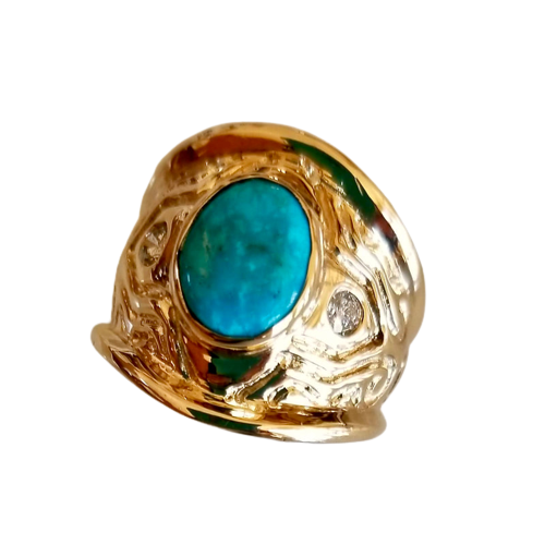 Wide patterned gold ring with Turquoise and inset diamonds.