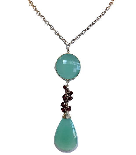 terling Silver necklace with a faceted round and pear shaped Aqua Chalcedony with small Rhodolite Garnet dangling beads between them.