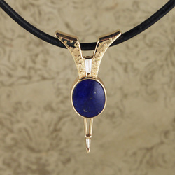 18 Karat Yellow Gold slide pendant with baguette shaped diamonds and an oval shaped Lapis inlay.