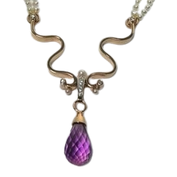 14 Karat Yellow Gold double strand Freshwater Pearls with a pendant with Diamonds, small Pearls and a Briolette Amethyst in the center.