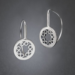 Sterling Silver circle earrings with small open circles with the main circle.
