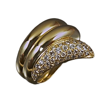 Three row gold band with the end row curved outward with pave diamonds.