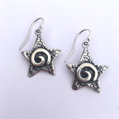 Sterling Silver star shaped French Wire earrings with spiral designs and an oxidized background.