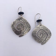 Sterling Silver textured spiral shaped French Wire earrings with a black glass bead.