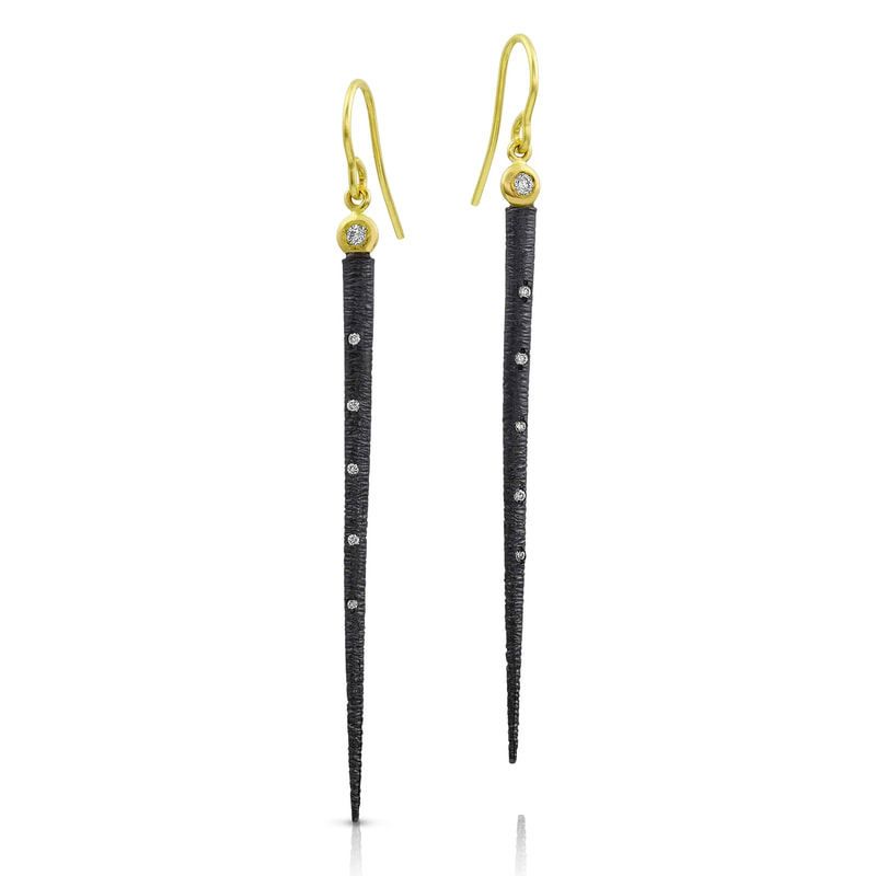 14 Karat Yellow Gold French wire earrings with an elongated Blackened Sterling Silver pointed dangle with diamonds.