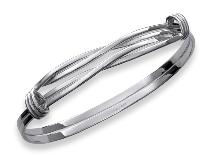 Sterling Silver bangle bracelet with two double twisted lines and a triple row wrapped on each side of the top.