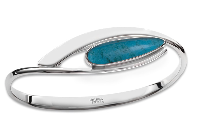 Sterling Silver bangle bracelet with a bezel set elongated tear shaped Turquoise.