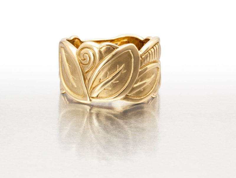 18 Karat Yellow Gold wide carved Leaf band ring.