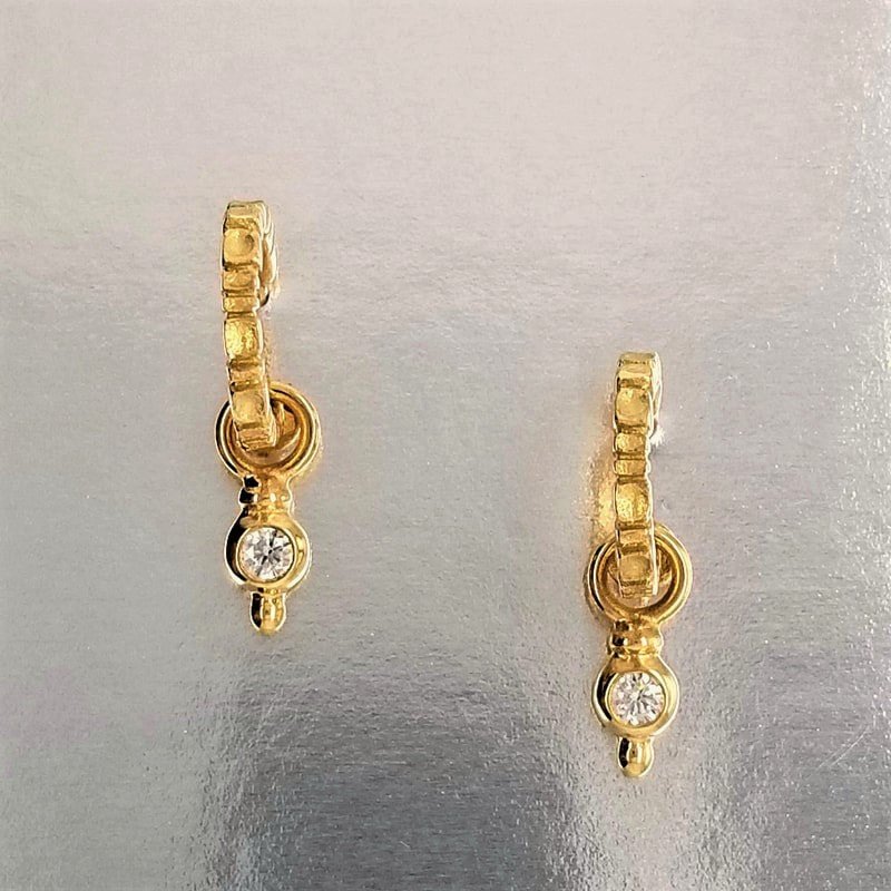 18KY earring charms with one Diamond shown on a pair of 18 Karat Yellow Gold demi post hoops.