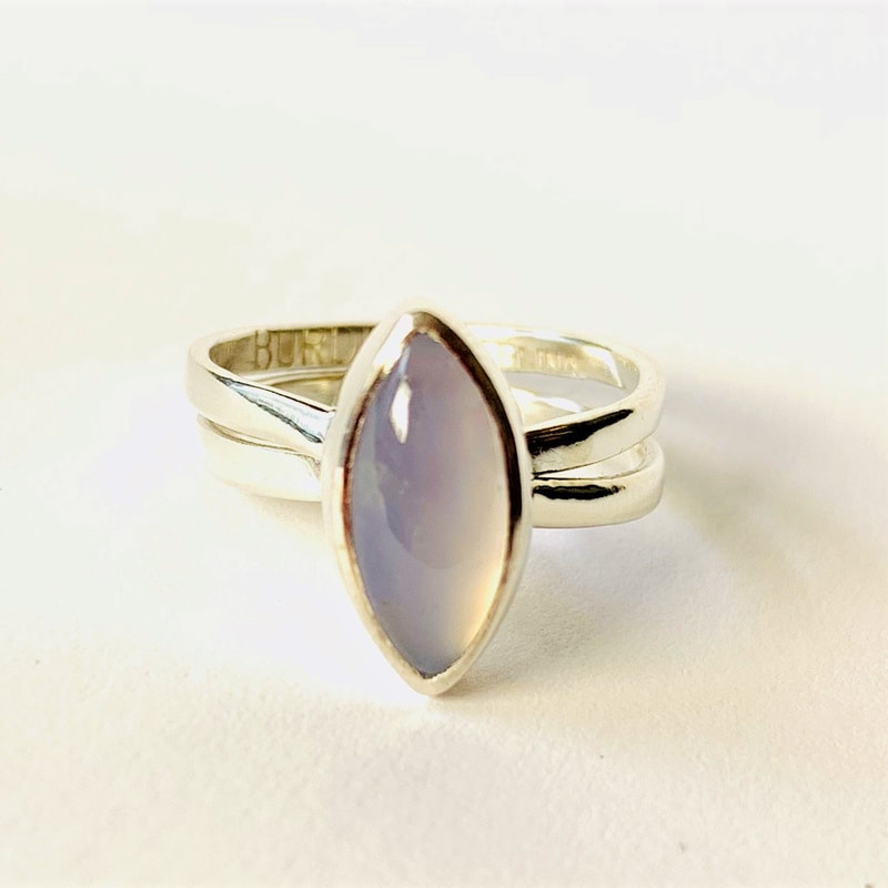 Sterling Silver Marquise Blue Chalcedony “Infinity” Ring.