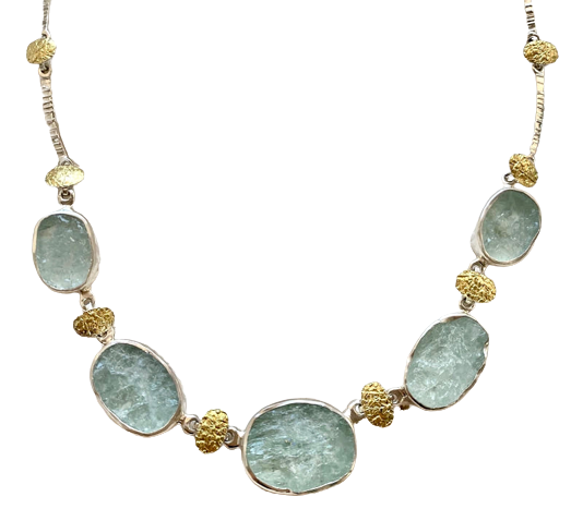 Silver and 22 Karat Yellow Gold Bi-Metal link necklace with oval natural face aquamarines.