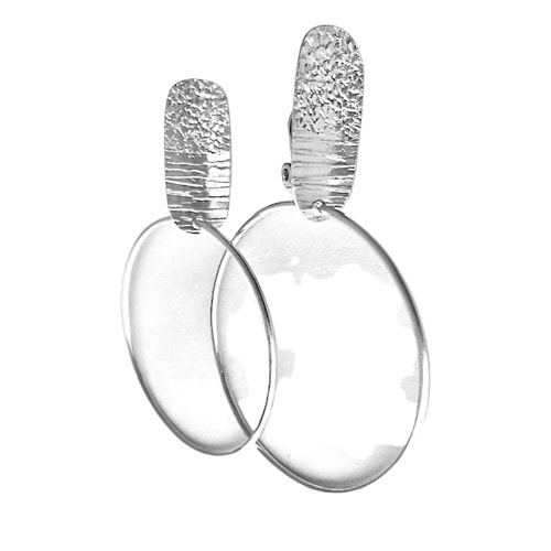 Sterling Silver Clip-on earring with a textured oval shape station on the top with a hoop on the bottom.