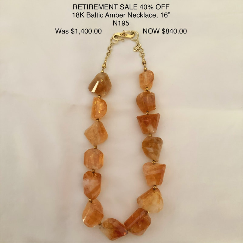 18 Karat Yellow Gold necklace with large irregular shaped chunky Amber beads.