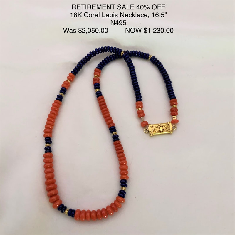18 Karat Yellow Gold necklace with Lapis and Coral beads.