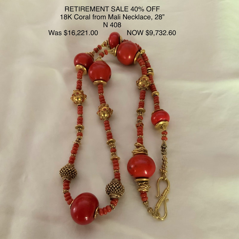 18 Karat Yellow Gold beaded Necklace with large gold beads and Coral from Mali.