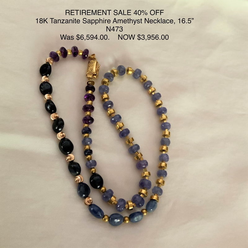18 Karat Yellow Gold beaded necklace with Blue Sapphires and Tanzanite alternating with gold beads.