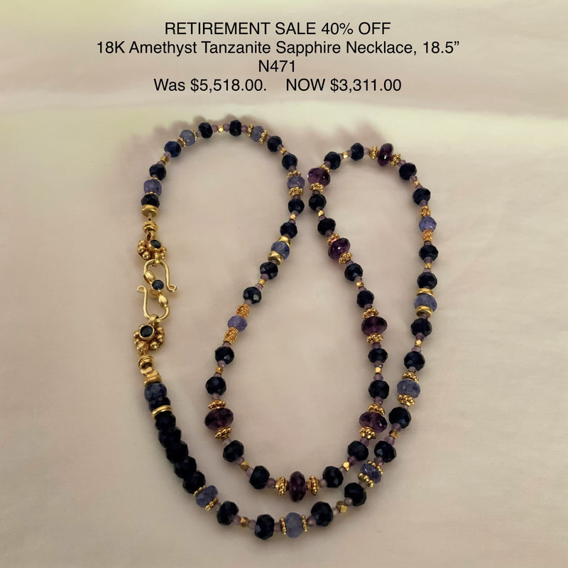 18 Karat Yellow Gold beaded necklace with Blue Sapphire, Amethyst and Tanzanite.