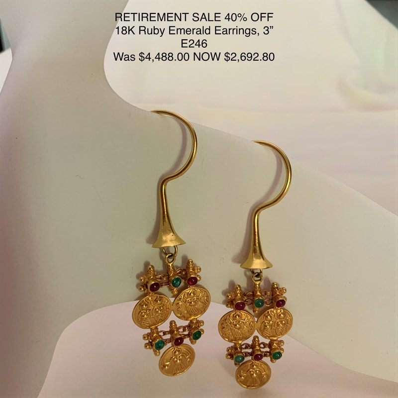 18 Karat Yellow Gold Earrings with gold discs, Rubies & Emerald accents., 
