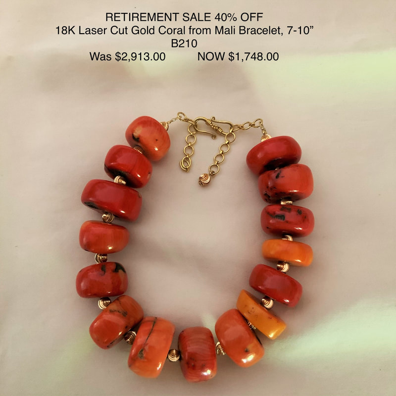 18 Karat Yellow Gold Bracelet with large barrel shaped Coral from Mali.
