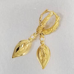 18 Karat Yellow Gold Large Leaf earrings with lever backs and diamonds.