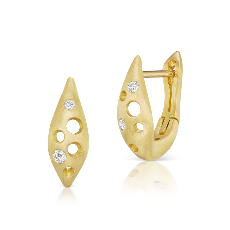 18 Karat Yellow Gold hoop style hinged earrings with open circles and flush set diamonds.