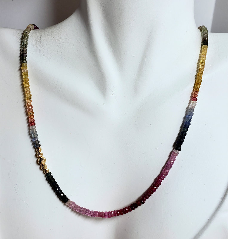 14K Yellow Gold multi-colored Sapphire necklace.