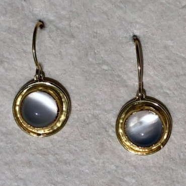 Gold dangle earrings with round bezel set White Moonstone.