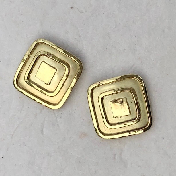 18 Karat Yellow Gold square post earrings.