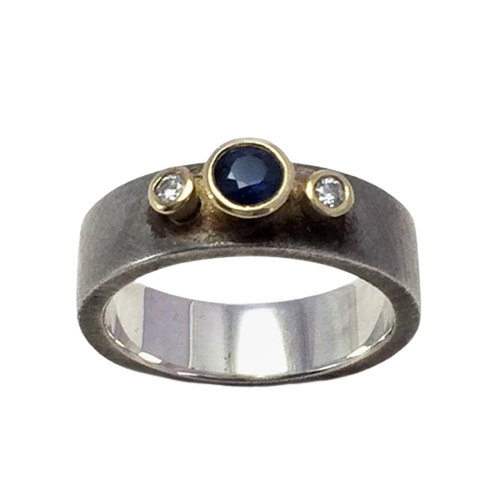 18 Karat Yellow Gold & Sterling Silver Ring with one  Blue Sapphire & two Diamonds.