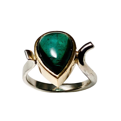 18 Karat Yellow Gold & Sterling Silver Pear Shaped Cabochon Green Tourmaline and Diamond accent.