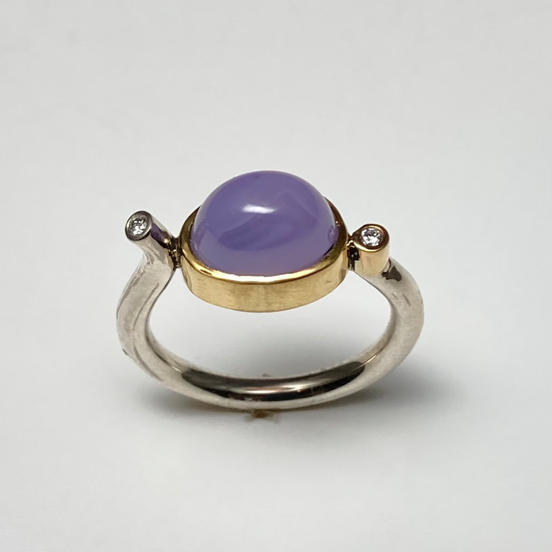 18 Karat Yellow Gold & Sterling Silver Ring with Lavender Chalcedony & two Diamonds at the tips of the band.