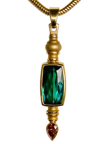18 Karat Yellow Gold Pendant with one rectangular shaped Green Tourmaline & Orange Diamond. 