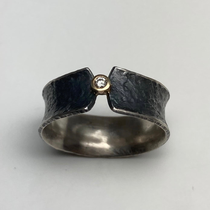 18 Karat Yellow Gold & Oxidized Sterling Silver Ring with one diamond.