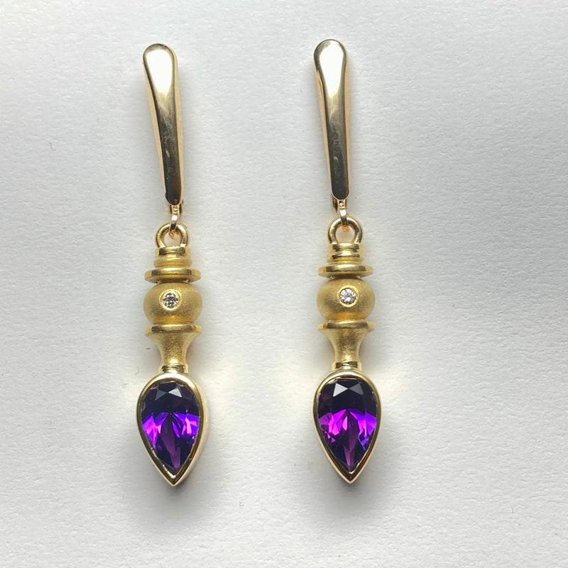 18 Karat Yellow Gold Earrings with Pear Shaped Natural Amethyst & Diamonds.