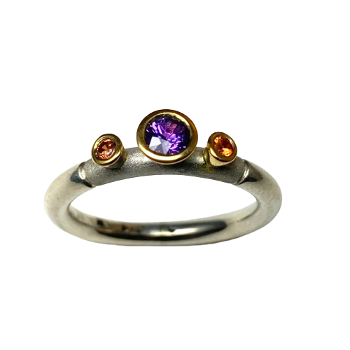 18 Karat Yellow Gold & Sterling Silver 4mm ring with Grape Sapphire & Two 2mm Tangerine Sapphires.
