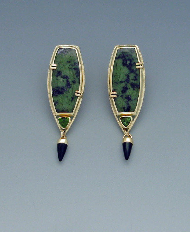 18 Karat Yellow gold Omega back earrings with Natural Jade, Green Tourmaline and Black Onyx pointed dangles.