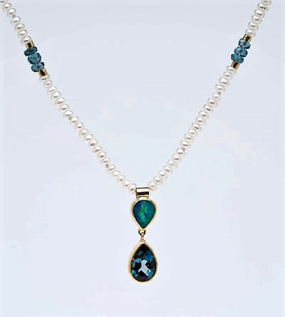 22KY & 18KY small pearl necklace with a pear shaped opal and blue topaz pendant.