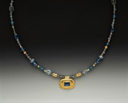 22 Karat & 18 Karat Yellow Gold gemstone beaded necklace with a center square pendant in gold and Kyanite.