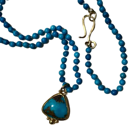 22K and 18K Yellow Gold Turquoise pendant on a Turquoise beaded chain.