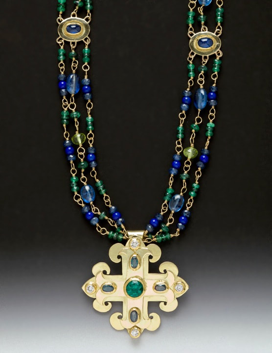 18KY & 22KY three strand gemstone beaded necklace with a large cross pendant with gemstones.