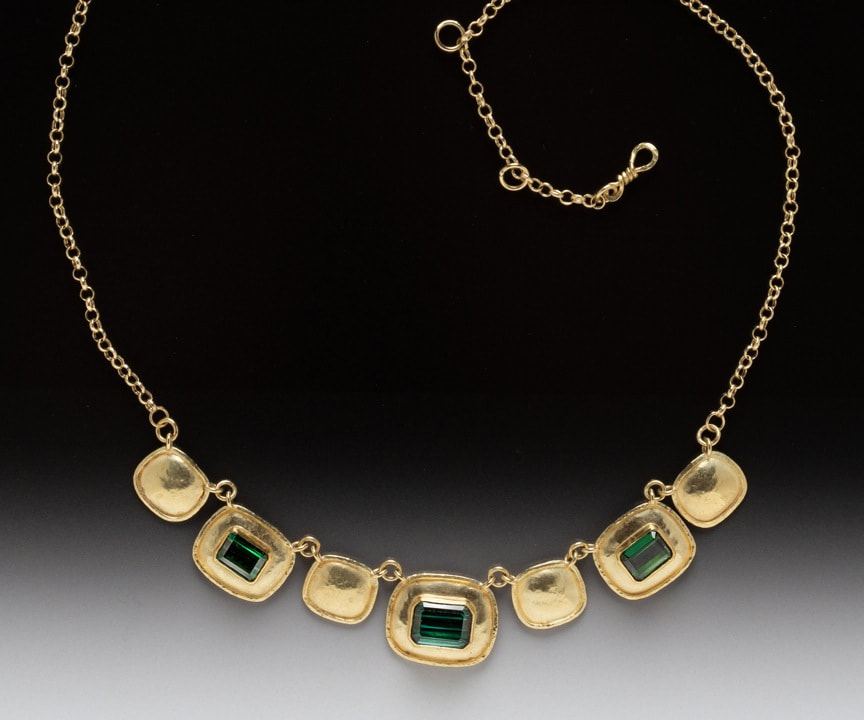 18KY & 22KY Gold Necklace with 7 square hand hammered stations and Green Tourmaline in the center of three.