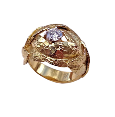 Yellow gold ring with sculpted leaves surrounding a round diamond