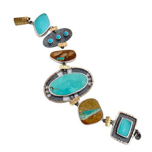 Sterling Silver Bracelet with 22KY between stations of all different shapes and kinds of Turquoise.