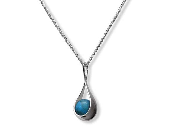 Sterling Silver Pendant with a Turquoise Bead and Chain.