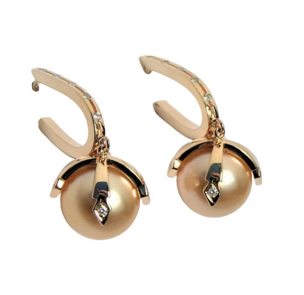 14 Karat Yellow Gold Golden Pearl hoop earrings with four prongs with diamond accents on the pearl.