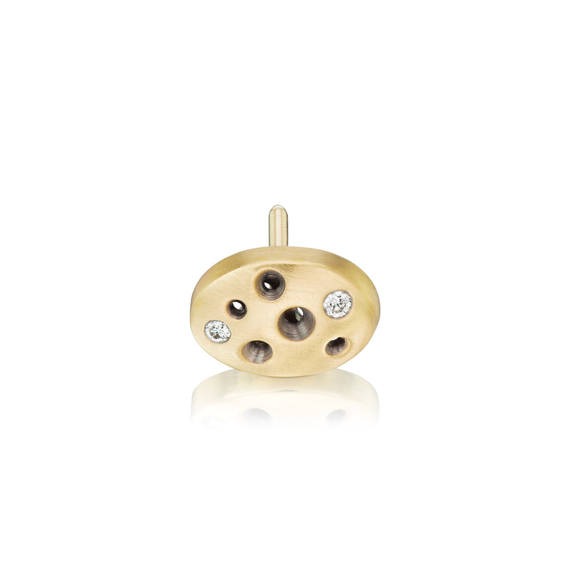 18 Karat Yellow Gold circular pin with diamonds and open circles.
