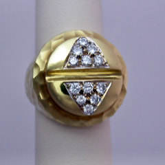 18 Karat yellow gold ring with a round top and two triangles with pave natural diamonds set in each.