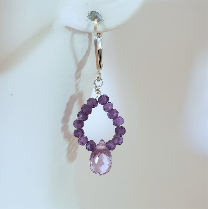Sterling Silver lever-back dangle earrings with a faceted briolette Pink Amethyst and darker small Amethysts leading to the top.