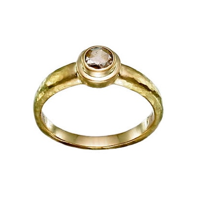 18 Karat Yellow Gold band with a diamond in the center.
