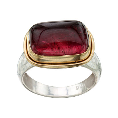 Sterling Silver band with a rectangular Pink Tourmaline bezel set with 18KY Gold in the center.